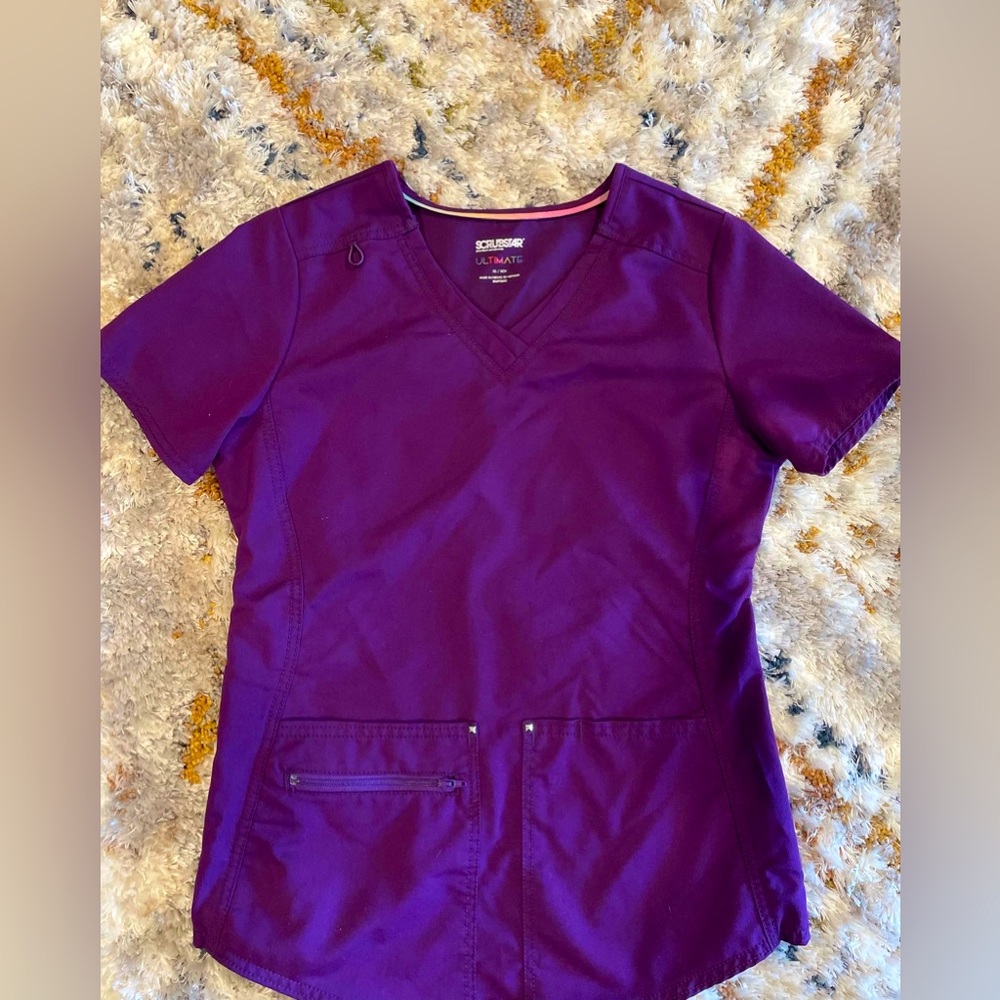 SCRUBSTAR size xs woman’s scrub set selling for $35.